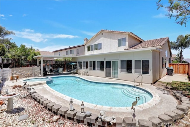 20895 Parish Pl, Riverside, CA 92508 - view of pool featuring a fenced backyard, a patio area, and a pool with connected hot tub