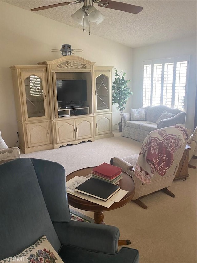 10815 Cherry Hls, Cherry Valley, CA 92223 - carpeted living area with ceiling fan and a textured ceiling