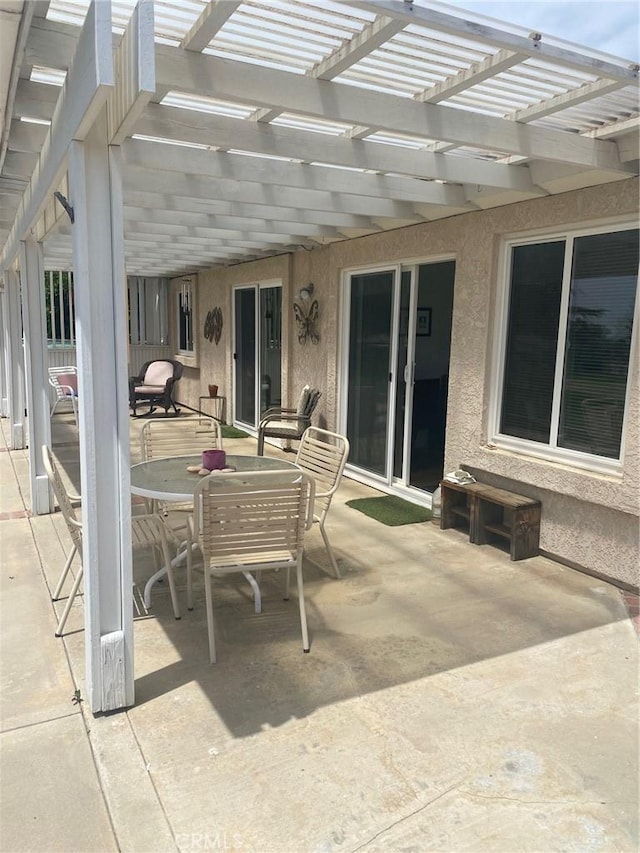 10815 Cherry Hls, Cherry Valley, CA 92223 - view of patio with outdoor dining area and a pergola
