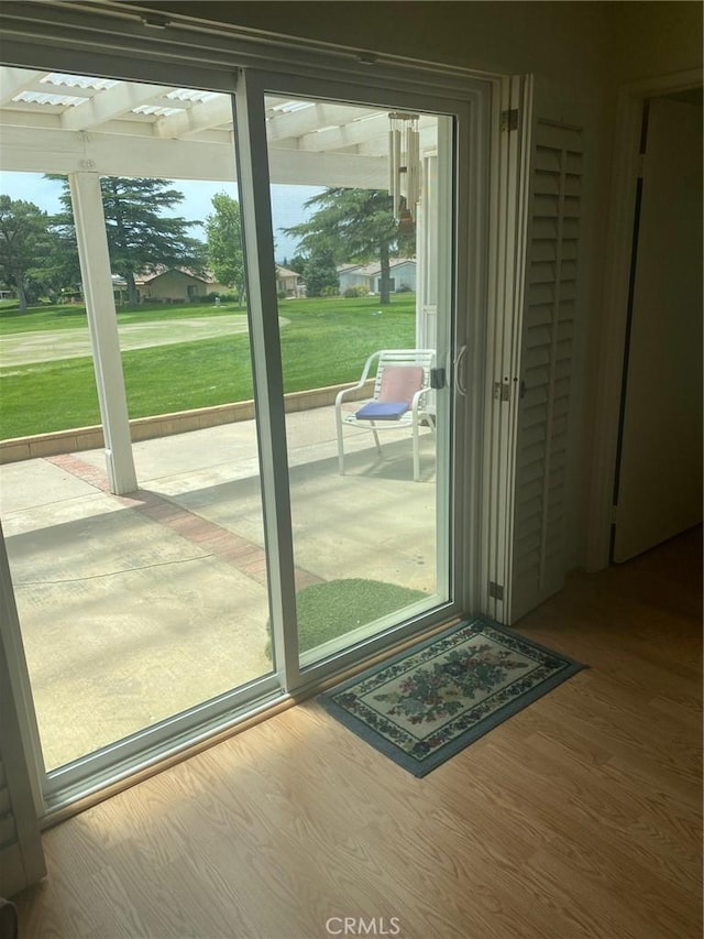10815 Cherry Hls, Cherry Valley, CA 92223 - doorway to outside featuring wood finished floors