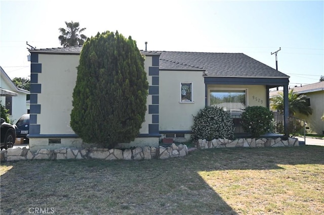 9529 Annetta Ave, South Gate, CA 90280 - view of front of property featuring a front lawn and roof with shingles