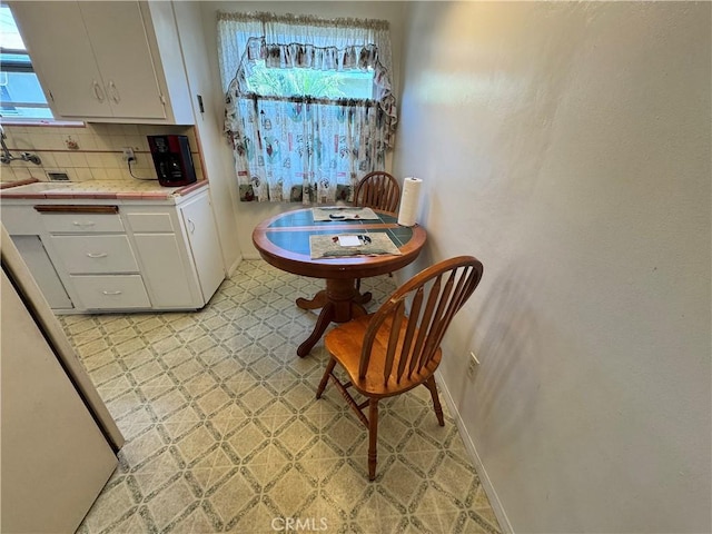 9529 Annetta Ave, South Gate, CA 90280 - dining area featuring light flooring and baseboards