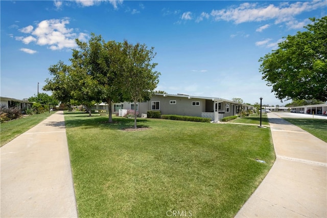 view of front of property with a front yard