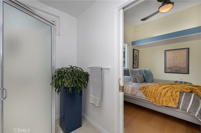 bedroom featuring baseboards