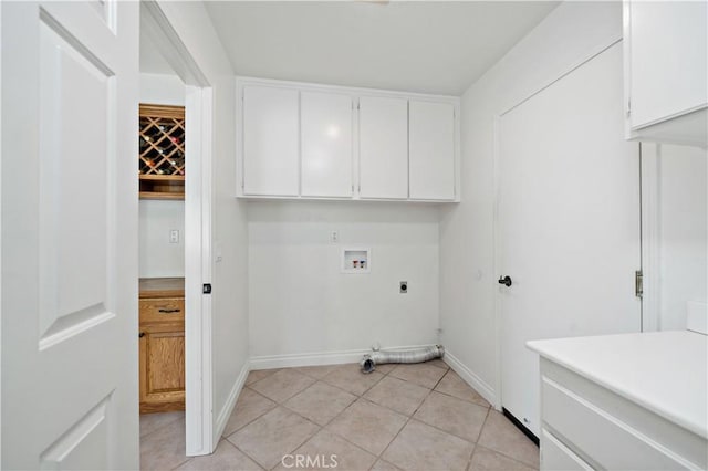 40686 Via Jalapa, Murrieta, CA 92562 - clothes washing area with cabinet space, hookup for an electric dryer, hookup for a washing machine, light tile patterned floors, and hookup for a gas dryer