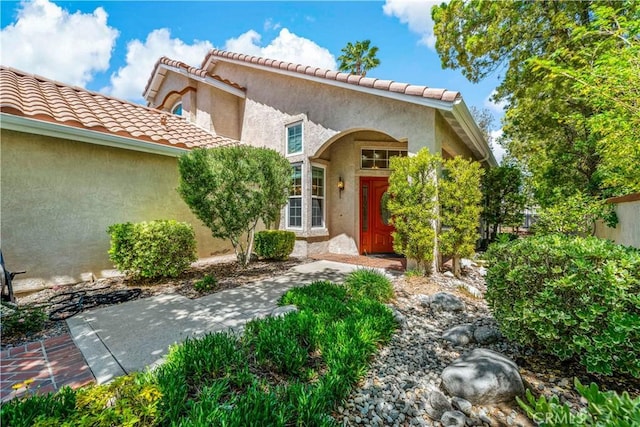 40686 Via Jalapa, Murrieta, CA 92562 - view of front of home with a tile roof and stucco siding