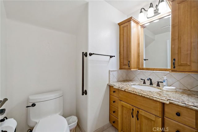 40686 Via Jalapa, Murrieta, CA 92562 - bathroom with toilet, tasteful backsplash, and vanity