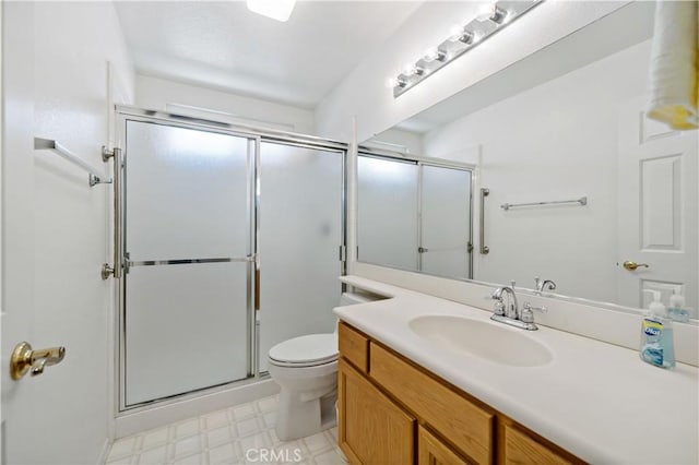 40686 Via Jalapa, Murrieta, CA 92562 - bathroom featuring tile patterned floors, an enclosed shower, toilet, and vanity