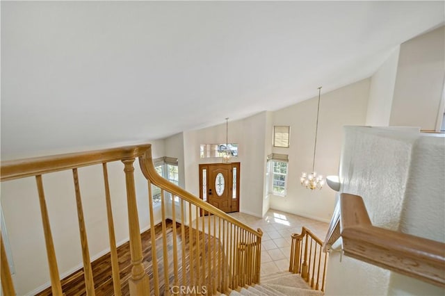 40686 Via Jalapa, Murrieta, CA 92562 - staircase with a chandelier, high vaulted ceiling, and tile patterned floors