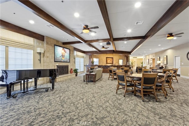 40686 Via Jalapa, Murrieta, CA 92562 - carpeted dining space with a ceiling fan, beamed ceiling, baseboards, a fireplace, and recessed lighting