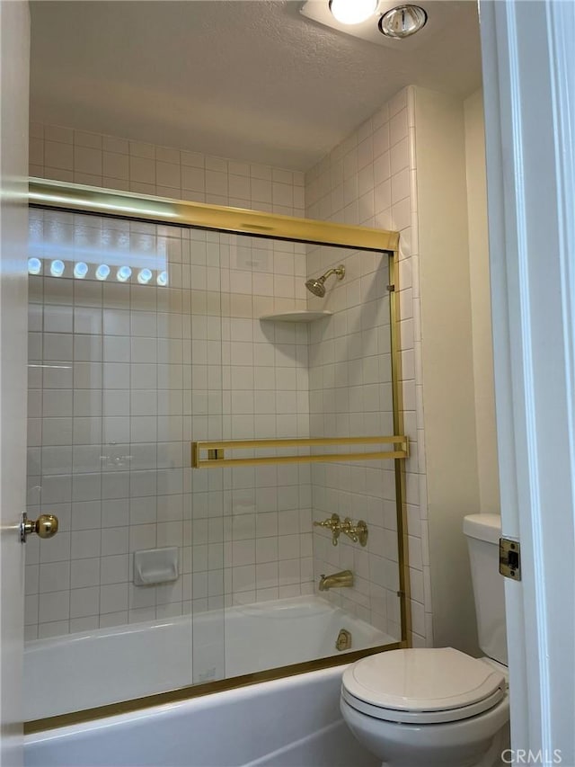 full bathroom with toilet and enclosed tub / shower combo