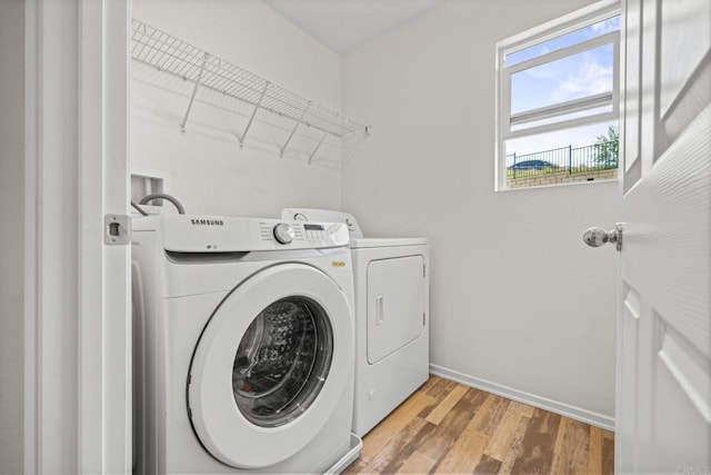 341 Dun Blazer Way, Fallbrook, CA 92028 - washroom featuring independent washer and dryer, light wood finished floors, and baseboards