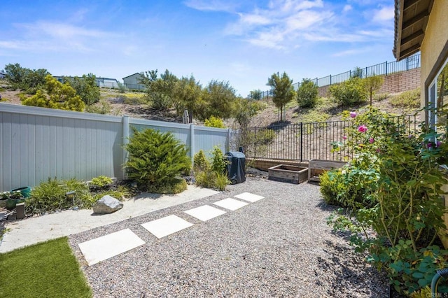 341 Dun Blazer Way, Fallbrook, CA 92028 - fenced backyard with a vegetable garden