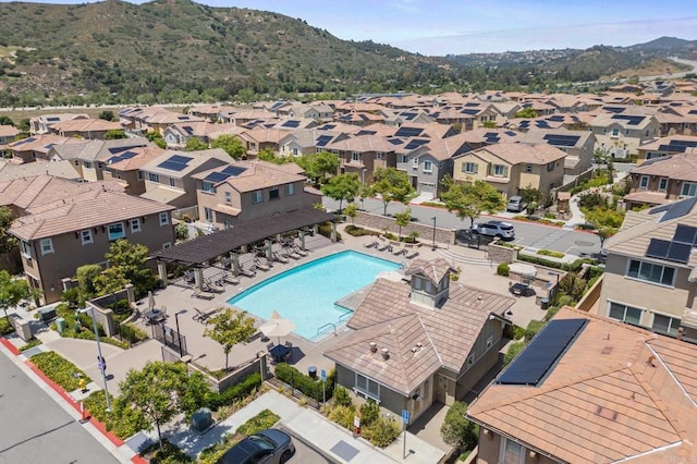 341 Dun Blazer Way, Fallbrook, CA 92028 - aerial perspective of suburban area featuring a pool and a mountain backdrop