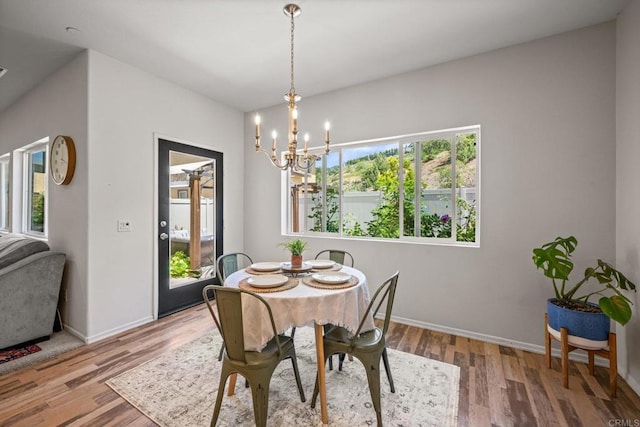 341 Dun Blazer Way, Fallbrook, CA 92028 - dining area featuring a chandelier, baseboards, and wood finished floors