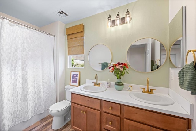 341 Dun Blazer Way, Fallbrook, CA 92028 - bathroom with double vanity, toilet, wood finished floors, and curtained shower