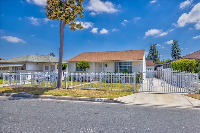 8873 Coolhurst Dr, Pico Rivera, CA 90660 - ranch-style home featuring a fenced front yard and a gate