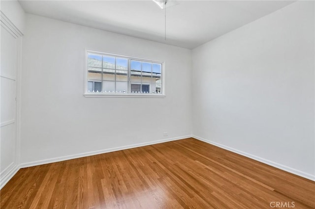 8873 Coolhurst Dr, Pico Rivera, CA 90660 - unfurnished room with wood finished floors and baseboards