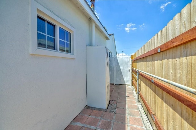 8873 Coolhurst Dr, Pico Rivera, CA 90660 - view of side of property featuring stucco siding