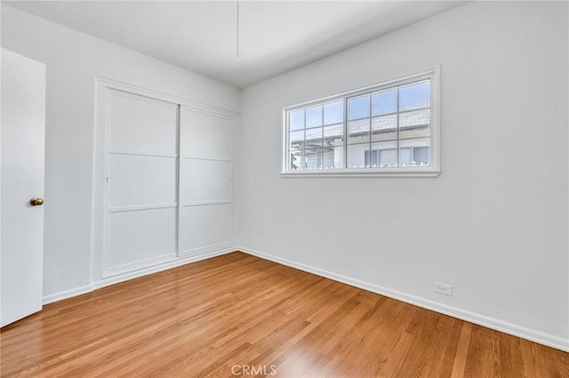 8873 Coolhurst Dr, Pico Rivera, CA 90660 - unfurnished room featuring light wood-style flooring and baseboards