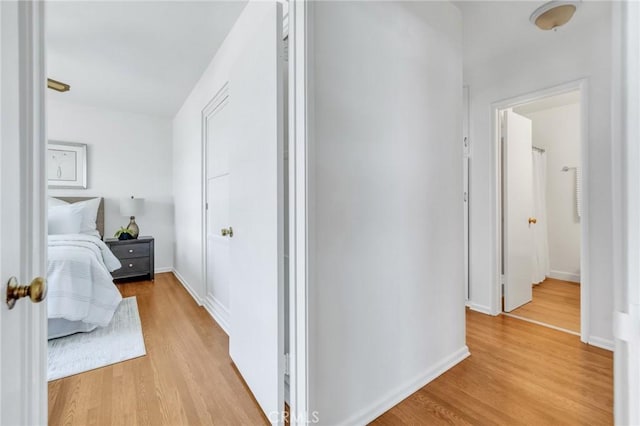 8873 Coolhurst Dr, Pico Rivera, CA 90660 - corridor with light wood finished floors and baseboards
