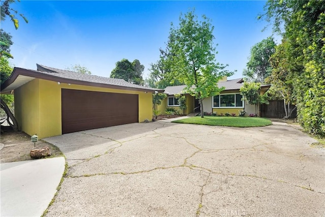 214 W Le Roy Ave, Arcadia, CA 91007 - ranch-style home featuring driveway, a garage, and stucco siding
