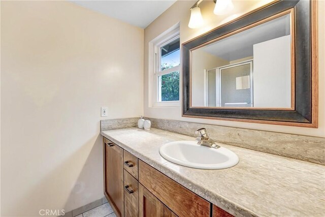 214 W Le Roy Ave, Arcadia, CA 91007 - bathroom with vanity, a shower stall, and tile patterned flooring
