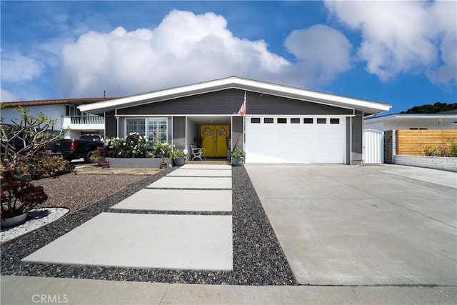 5158 Elderhall Ave, Lakewood, CA 90712 - view of front of house featuring an attached garage, driveway, and fence