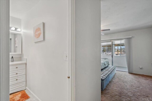 1278 E Madison Ave Unit D, El Cajon, CA 92021 - corridor with carpet and baseboards