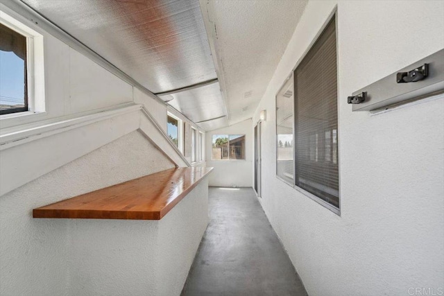 1278 E Madison Ave Unit D, El Cajon, CA 92021 - corridor featuring concrete flooring and a textured wall