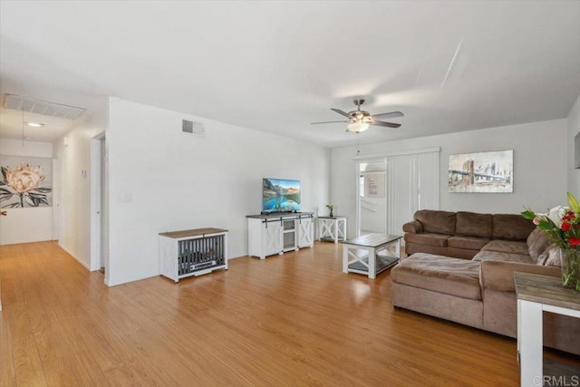 1278 E Madison Ave Unit D, El Cajon, CA 92021 - living area featuring light wood finished floors and a ceiling fan
