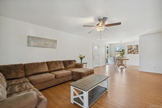 1278 E Madison Ave Unit D, El Cajon, CA 92021 - living room with a ceiling fan and light wood finished floors