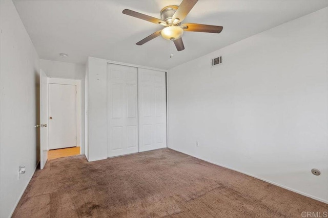 1278 E Madison Ave Unit D, El Cajon, CA 92021 - unfurnished bedroom featuring carpet floors, a closet, and ceiling fan