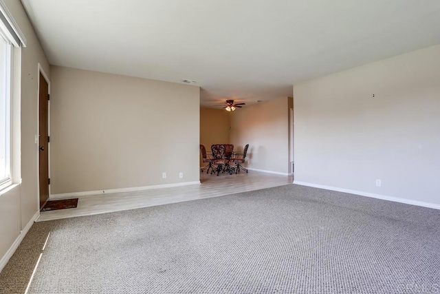 4379 Albatross Way, Oceanside, CA 92057 - unfurnished living room with carpet, baseboards, and ceiling fan