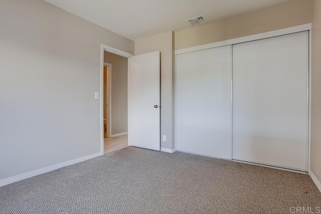 4379 Albatross Way, Oceanside, CA 92057 - unfurnished bedroom with carpet flooring, a closet, and baseboards