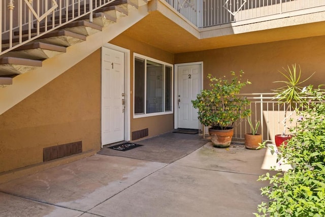 5510 Adelaide Ave Unit 1, San Diego, CA 92115 - property entrance featuring stucco siding, a patio, and fence
