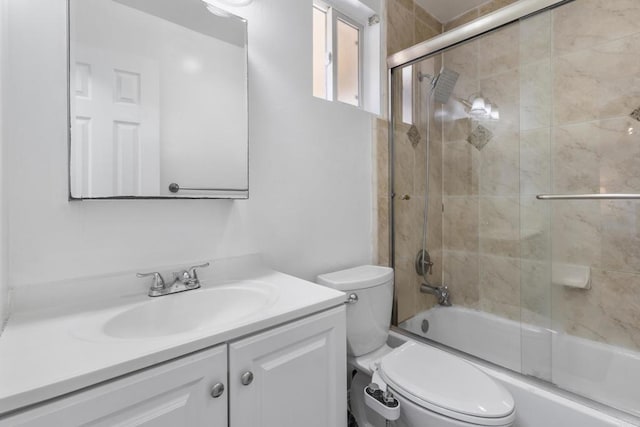 5510 Adelaide Ave Unit 1, San Diego, CA 92115 - bathroom featuring toilet, vanity, and combined bath / shower with glass door