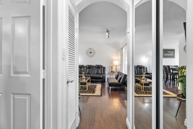 5510 Adelaide Ave Unit 1, San Diego, CA 92115 - corridor featuring dark wood-style floors, arched walkways, and track lighting