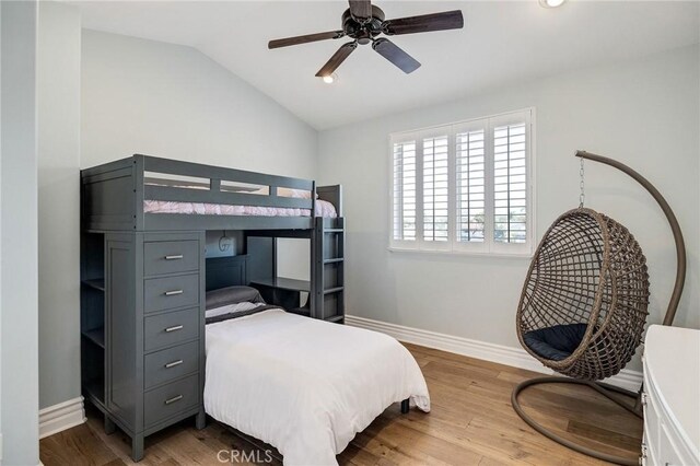 737 35th St, Manhattan Beach, CA 90266 - bedroom featuring wood finished floors, baseboards, lofted ceiling, and a ceiling fan