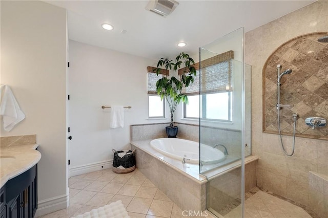737 35th St, Manhattan Beach, CA 90266 - full bath with a garden tub, walk in shower, vanity, tile patterned floors, and baseboards