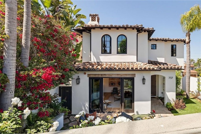 737 35th St, Manhattan Beach, CA 90266 - back of property with stucco siding and a chimney