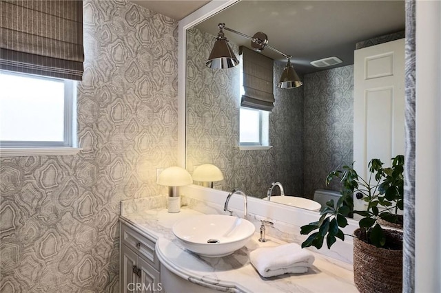 737 35th St, Manhattan Beach, CA 90266 - bathroom with wallpapered walls, vanity, and toilet