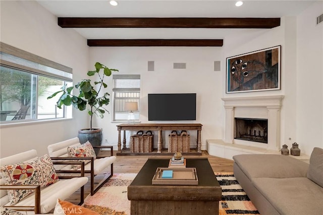 737 35th St, Manhattan Beach, CA 90266 - living room with wood finished floors, recessed lighting, beamed ceiling, and a fireplace with raised hearth