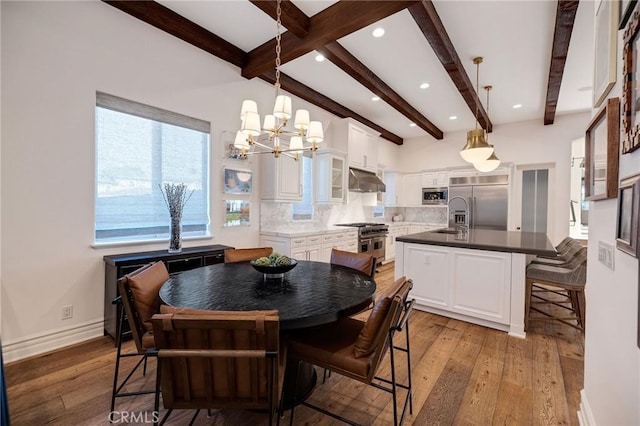 737 35th St, Manhattan Beach, CA 90266 - dining space featuring beamed ceiling, a chandelier, light wood finished floors, recessed lighting, and baseboards
