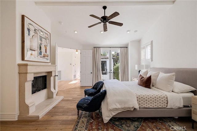 737 35th St, Manhattan Beach, CA 90266 - bedroom featuring access to outside, wood finished floors, a premium fireplace, recessed lighting, and baseboards