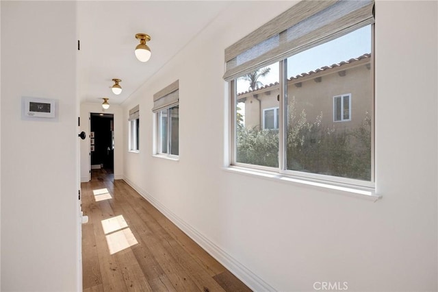 737 35th St, Manhattan Beach, CA 90266 - corridor featuring hardwood / wood-style flooring and baseboards