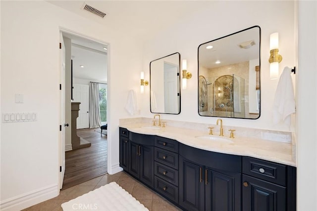 737 35th St, Manhattan Beach, CA 90266 - bathroom featuring a shower stall, tile patterned floors, double vanity, baseboards, and recessed lighting