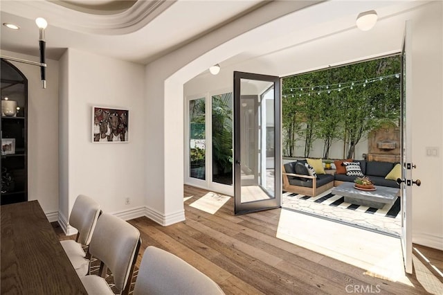 737 35th St, Manhattan Beach, CA 90266 - doorway to outside featuring wood finished floors, arched walkways, baseboards, and recessed lighting