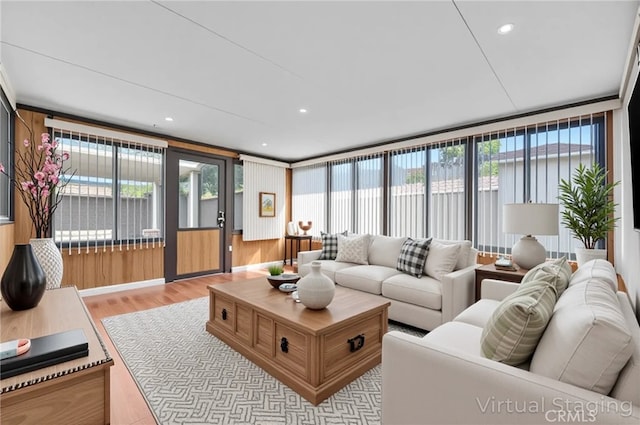 12820 Pan Am Blvd, Moreno Valley, CA 92553 - living area with light wood-style floors, plenty of natural light, and recessed lighting