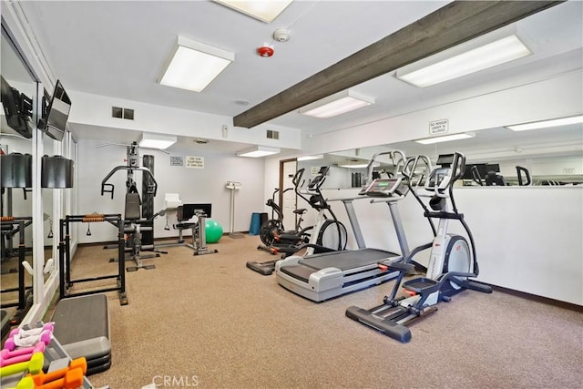 22100 Burbank Blvd Unit 150F, Woodland Hills, CA 91367 - workout area featuring baseboards, beamed ceiling, and carpet